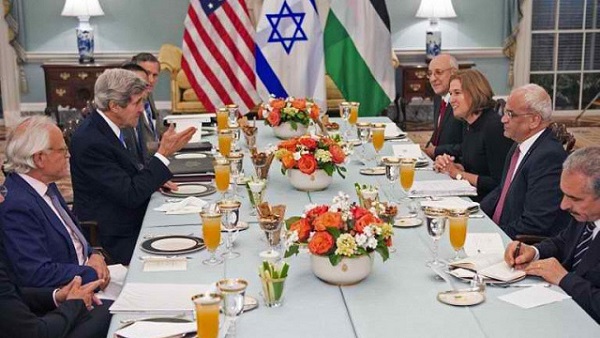 TALKING PEACE. US Secretary of State Kerry (center-L) hosts dinner for the Middle East Peace Process Talks, at the Department of State with Israeli Mr. Isaac Molho (right rear) , Israeli Justice Minister Tzipi Livni (right 2nd from end) and Palestinian chief negotiator Saeb Erakat (3rd), and Palestanian Dr. Shtayyeh (lower right corner) in the Thomas Jefferson Room of the US Department of State July 29, 2013, in Washington, DC. The parties meet again July 30th, 2013 here. Photo by AFP/Paul J. Richards