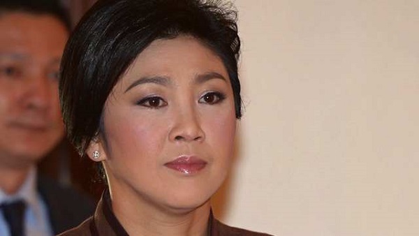 DISSOLVE PARLIAMENT Thai Prime Minister Yingluck Shinawatra announces she will dissolve parliament. AFP / Pornchai Kittiwongsakul