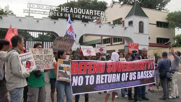 STOP US INTERVENTION: Militant groups troop to the Armed Forces headquarters to protest increased presence of US troops. Photo by Carmela Fonbuena/Rappler.com