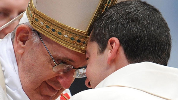 MODEL PRIEST. Pope Francis embraces a new priest during Mass at St Peter's Basilica in Vatican City, April 21. During the mass the Pope ordained 10 new priests. File photo by EPA/Ettore Ferrari