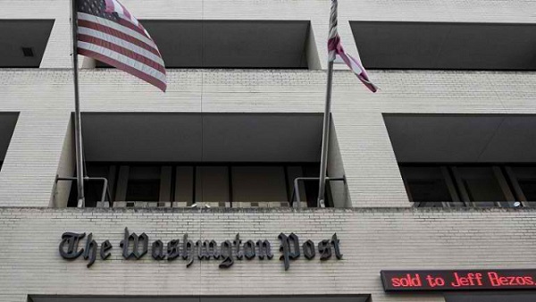 SOLD. The Washington Post is seen on August 5, 2013 in Washington, DC, after it was announced that Amazon.com founder and CEO Jeff Bezos had agreed to purchase the Post for USD 250 million. Photo by AFP/Brendan Smialowski