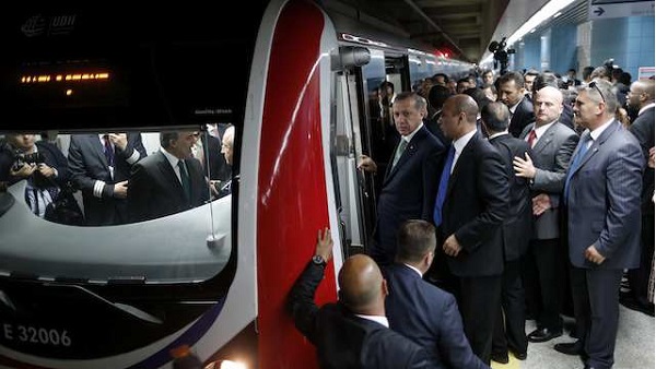 ASIA-EUROPE CONNECTION. Turkish Prime Minister Recep Tayyip Erdogan (C) arrives to test-drive a train as he attends the opening ceremony of the Marmaray railway, a subway tunnel submerged into the Bosphorus waterway in Istanbul, Turkey, 29 October2013. EPA/Tolga Bozoglu