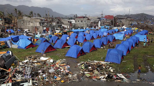 EMERGENCY SHELTER. Rows of tents are seen at an evacuation center in the super typhoon-devastated city of Tacloban, Leyte province, Philippines, 19 November 2013. EPA/FRANCIS R. MALASIG