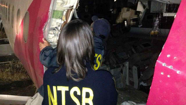 INVESTIGATION. National Transportation Safety Board Chairman Deborah Hersman and Investigator-in-Charge Bill English looking at interior damage to Asiana Flight 214 during their first site assessment in San Francisco, California. Photo by AFP/Handout/NTSB