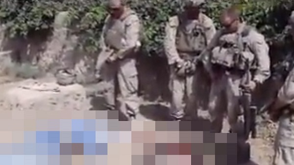 Screengrab from Youtube video "Marines urinating on dead soldiers Taliban"