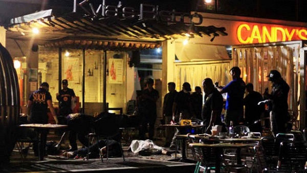 CRIME SCENE. Outside Kyla's Bistro at an arcade in Cagayan de Oro City, right after the explosion. Photo EPA/Bobby Lagsa