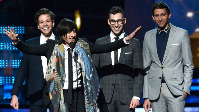 Producer Jeff Bhasker (2nd L, speaking) with musicians (L-R) Nate Ruess, Jack Antonoff and Andrew Dost of fun. accept Song of the Year award for 