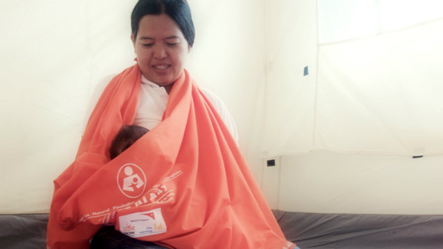BREASTFEEDING. A mother is taught the value of breastfeeding, especially in times of disaster. Photo from World Vision