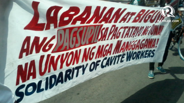 YES TO LABOR UNIONS. Solidarity of Cavite Workers (SCW) asks for right to unionize. Photo by Tricia Villaluz