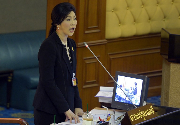 SURVIVES VOTE. Thai Prime Minister Yingluck Shinawatra speaks during a no-confidence debate at Parliament in Bangkok on November 26, 2013. AFP / Pornchai Kittiwongsakul