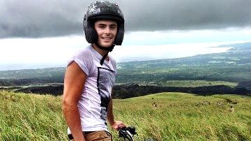 A PHOTO OF ZAC Efron ATV-ing up the lava flow of Mayon Volcano that the actor posted on his Facebook page