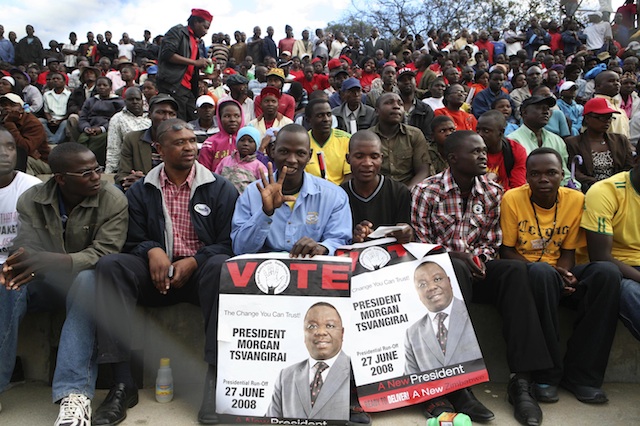 OPPOSITION RALLY. Party of Movement for Democratic Change (MDC) supporters attend a rally addressed by Morgan Tsvangirai (not pictured) at Sakubva Stadium, some 260 km east of the capital Harare, Zimbabwe, 13 July 2013. Photo by EPA/Aaron Ufumeli