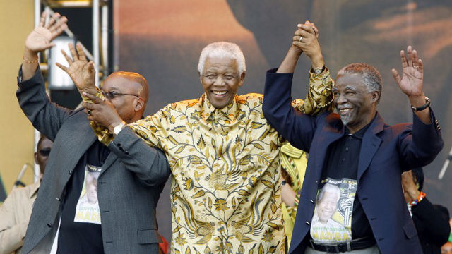 Jacob Zuma, Nelson mandela, and Thabo Mbeki during Mandela's 90th irthday celebration in 2008. GIANLUIGI GUERCIA/AFP FILE PHOTO