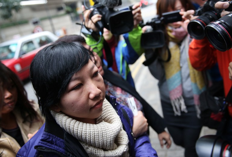 TORTURED. Former Indonesian maid Erwiana Sulistyaningsih arrives at the Wanchai Law Courts to begin giving evidence against her former employer who is accused of abuse and toture in Hong Kong on December 8, 2014. Photo by AFP 
