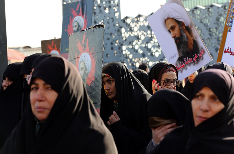 Iranian women gather during a demonstration against the execution of prominent Shiite Muslim cleric Nimr al-Nimr by Saudi authorities, at Imam Hossein Square in the capital Tehran on January 4, 2016. Tensions between Iran and its Sunni Arab neighbours reached new heights as Saudi Arabia and Gulf allies cut or downgraded diplomatic ties with Tehran in a row over the execution of a Shiite cleric. AFP PHOTO / ATTA KENARE