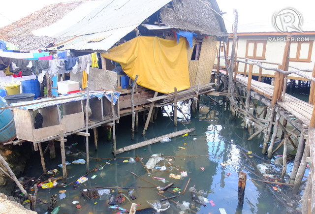 FILTH. Garbage floats on the waters of Coron Bay under a house with chicken cages, another source of filth if not maintained properly