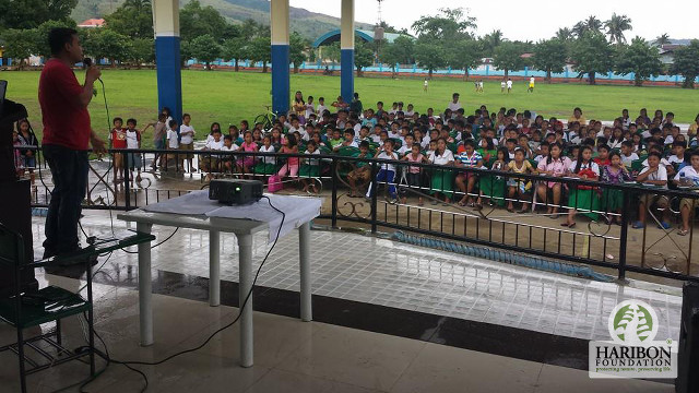 AWARENESS. Haribon Foundation members teach students from a Gabaldon school about the importance of the Philippine Eagle which was recently spotted in nearby mountain forests. Photo courtesy of Haribon Foundation