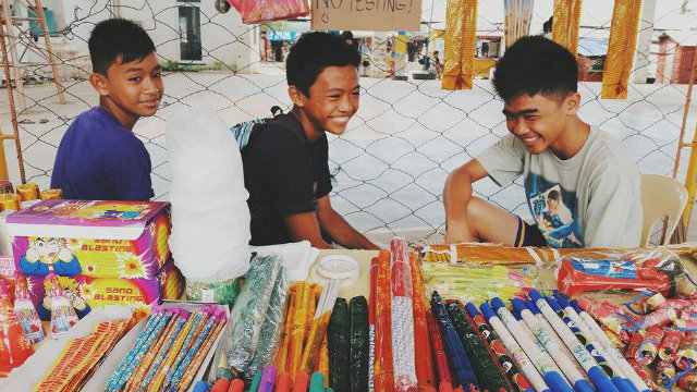 NEW YEAR. It’s as if nothing happened on November 13, 2013 just looking at the happy faces of  these boys selling firecrackers in the northern Iloilo town of Concepcion