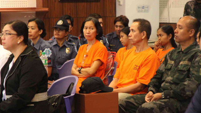 BLOW TO THE NPA. Wilma and Benito Tiamzon at the inquest proceedings in Camp Crame on March 24. File photo by PNP PIO