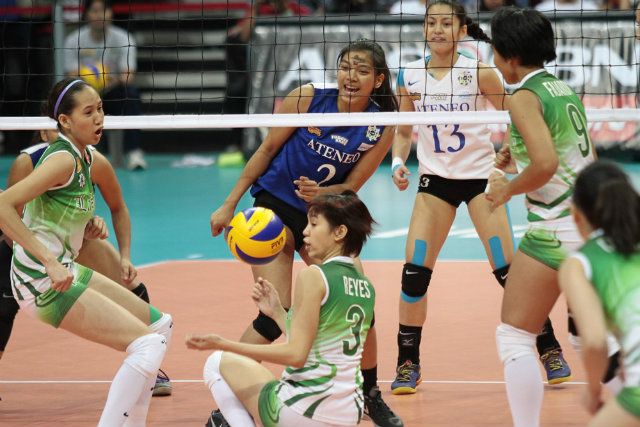 Mika Reyes tries to recover the ball as the Lady Eagles look on. Photo by Josh Albelda