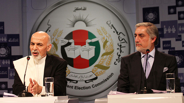 ONE-ON-ONE. Afghan presidential candidates Ashraf Ghani (L) and Dr. Abdullah Abdullah take part in a debate at 1 TV in Kabul, Afghanistan on February 8, 2014. Photo by S. Sabawoon/EPA
