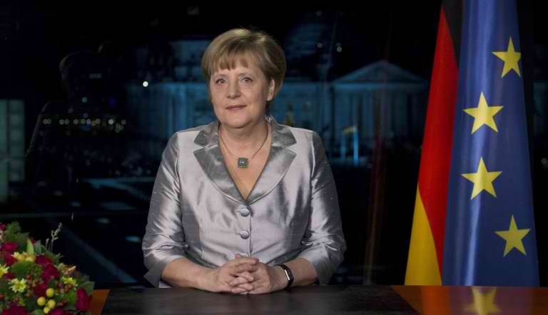 LOOKING FOR SOLUTIONS. German Chancellor Angela Merkel poses for photographers after the recording of her annual New Year's speech at the Chancellery in Berlin on December 30, 2012. AFP PHOTO / POOL/ JOHN MACDOUGALL