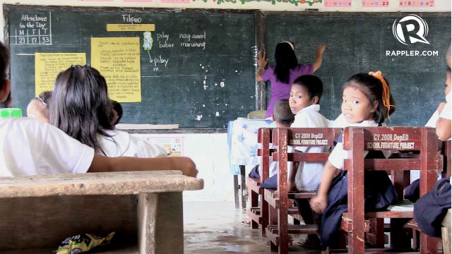 PASS OR FAIL? What lies ahead for Filipino schoolchildren in 2014? Photo by Zak Yuson/Rappler