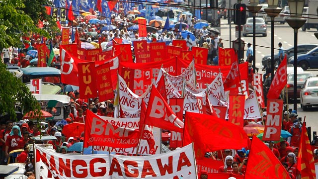 NAGKAISA. Thousand of workers belonging to Nagkaisa on their way to Mendiola, 01 May 2014. Photo by Ritchie Tongo/EPA