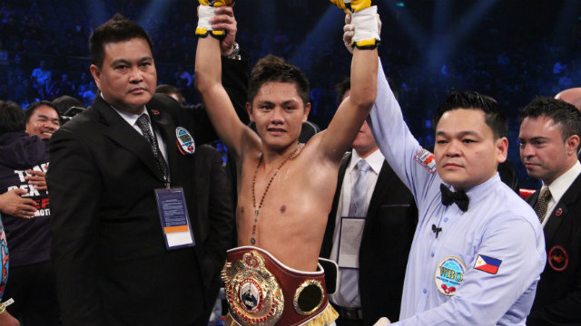 KO KID. Sonsona has his arms raised by WBO Asia Pacific VP Leon Panoncillo and referee Danrex Tapdasan after knocking Shimoda out. File photo by Sumio Yamada