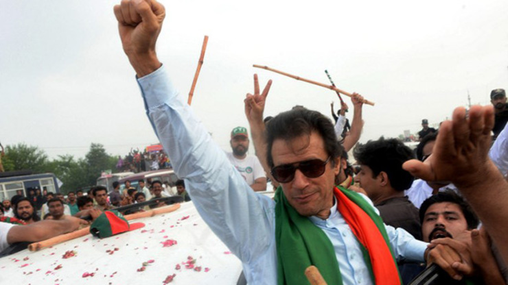 OPPOSITION LEADER. Pakistani cricketer-turned-politician Imran Khan gestures as he leads a protest march to Islamabad against the country's Pakistan Muslim League-Nawaz-led government in Wazirabad in eastern Punjab province on August 15. Photo by Asif Hassan/AFP