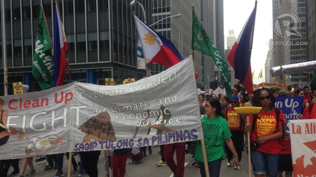 CLIMATE FRONT LINES. With the Philippines at the front lines of climate change, Filipino activists and domestic workers actively participate in the People's Climate March in New York. Photo by Ayee Macaraig/Rappler 