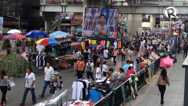 OCCUPY BANGKOK. A protest area in one of Bangkok's busiest streets resembles a street fair with vendors selling all sorts of wares and food. All photos by Zak Yuson/Rappler