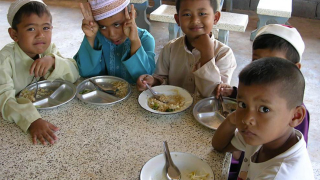 FOOD FOR THE YOUNG. To address child nutrition problems, Thailand has been implementing a national government-funded school lunch and milk feeding program since 1992. Photo from the World Food Programme