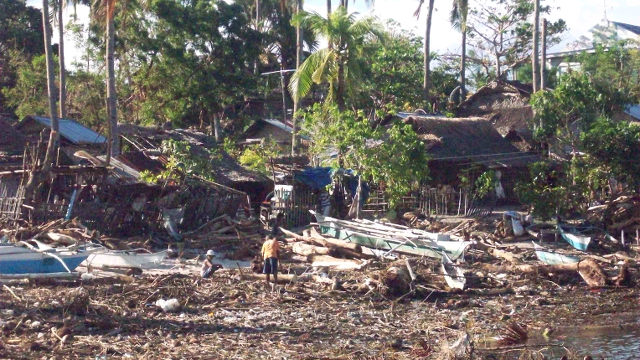 AFTER YOLANDA. Hundreds of homes in Tulang Diyot were damaged by Typhoon Yolanda yet all the residents survived because of early evacuation. Photo courtesy of San Francisco MDRRMO