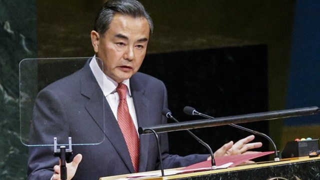 INTERNATIONAL LAW. Chinese Foreign Minister Wang Yi urges the international community to use international law in settling disputes. Photo by Kena Betancur/Getty Images/AFP