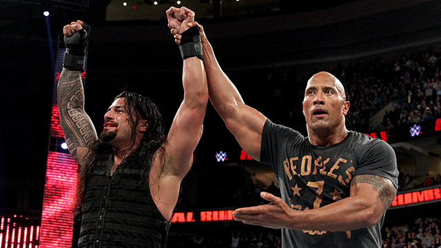 ROMAN REIGNS. The 2015 Royal Rumble winner has his hands raised by his cousin, The Rock. Photo from WWE.com